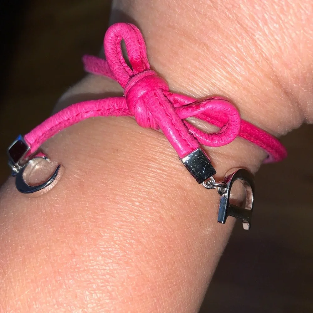 Authentic Christian Dior Leather and Metal Charm Bow Bracelet - Picture 10 of 11